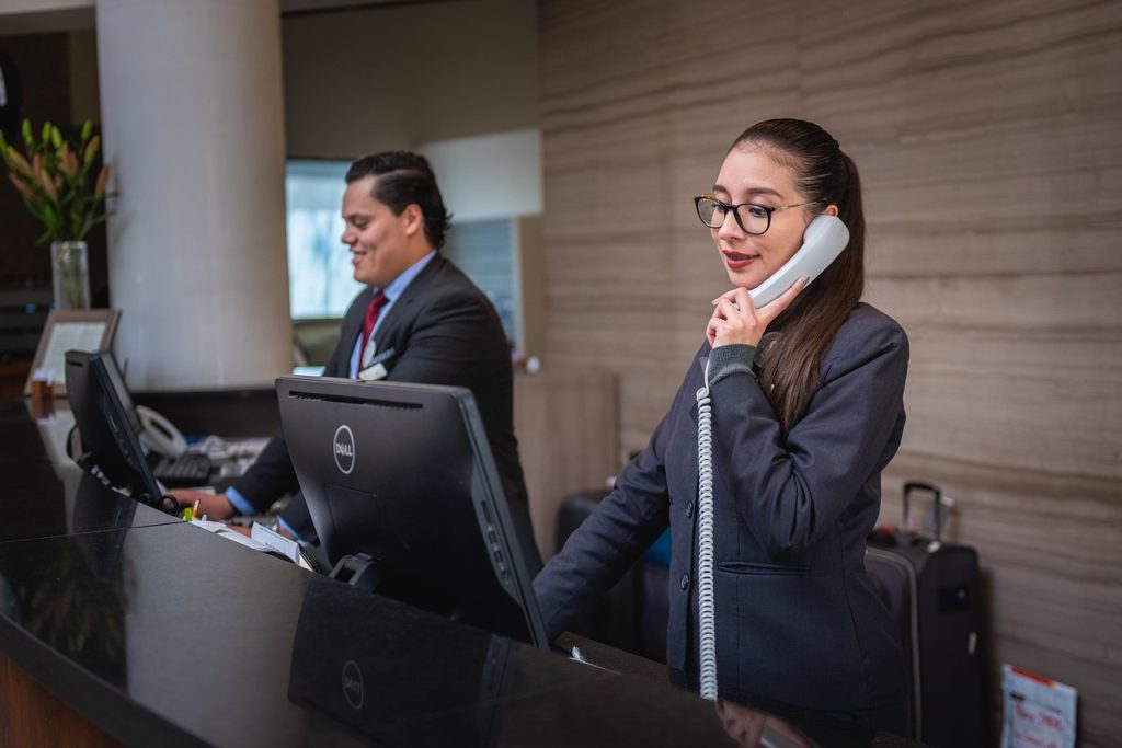 Trang chủ receptionists, phone call, hotel, reception, woman, man, work, attention, lobby, employees, professional, company, assistance, hotel, hotel, hotel, hotel, hotel, reception